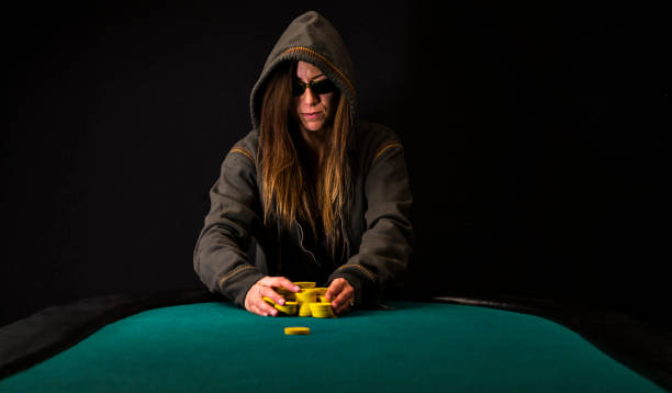 istock Woman Poker Player Pushing All-in 889752086