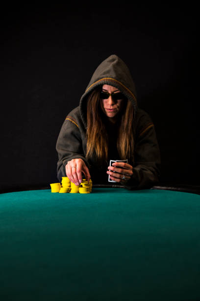 Woman Poker Player making a Bet