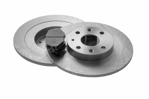 istock New car brake disc and brake linings on white background 889771464