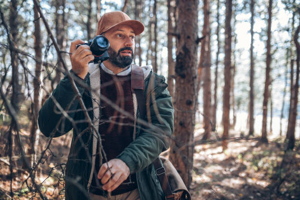 istock Photographer in the forest 889774272