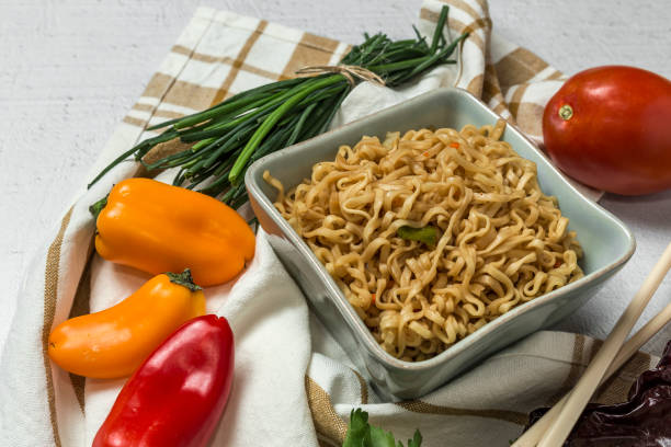 istock Noodles with vegetables. Typical oriental food 889774376