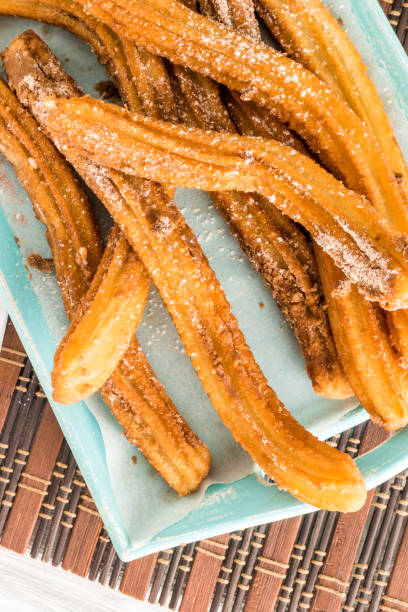 istock Traditional churros with hot chocolate 889811538