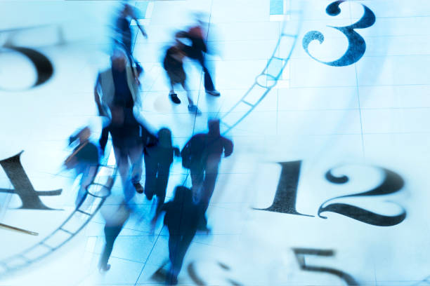 Montage Of Blurred Pedestrians Walking And Several Clock Faces