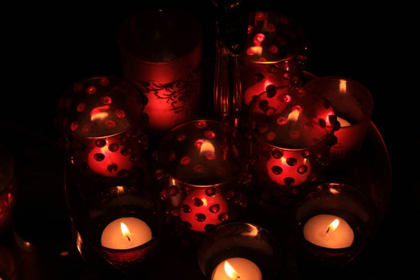 istock Red votives and candles 889828880