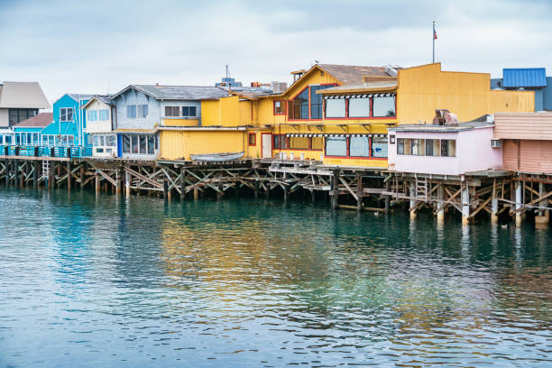 Old Fisherman's Wharf in Monterey California USA Stock photograph of the Old Fisherman's Wharf in Monterey, California, USA. Old Fisherman's Wharf is a shopping, dining and entertainment area located at the waterfront of Monterey. city of monterey california stock pictures, royalty-free photos & images