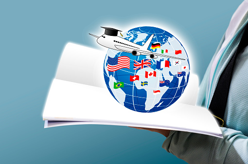 Study abroad concept design of Young woman open book and world education with national flag