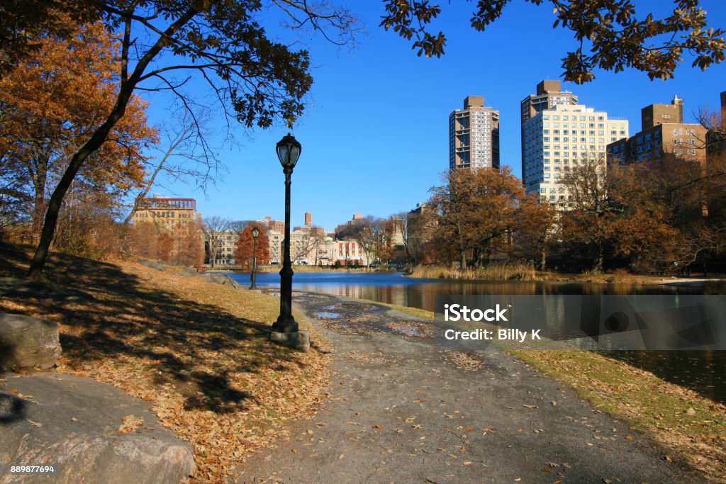 Scenic Lookout from Fort Clinton to the Harlem Meer Lake, Central Park Fort Clinton in New York City's Central Park was an 1814 stone-and-earthworks fortification on a rocky escarpment near the present line of 107th Street, slightly west of Fifth Avenue Autumn Leaf Color Stock Photo