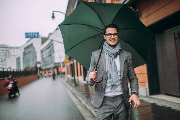 istock Travel man walking with suitcase 889892438