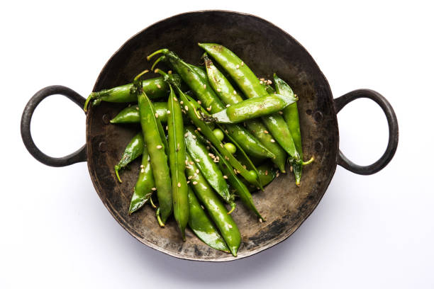 istock Spicy fried Green Peas pod or chatpata matar falli 889894830