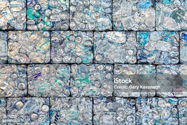 A Wall Of Crushed Aluminum Cans Recycled Into Building Blocks Stock Photo - Download Image Now