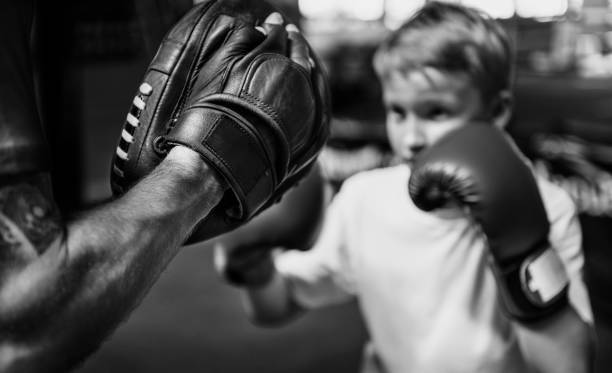 istock Young boy aspiring to become a boxer 889905562