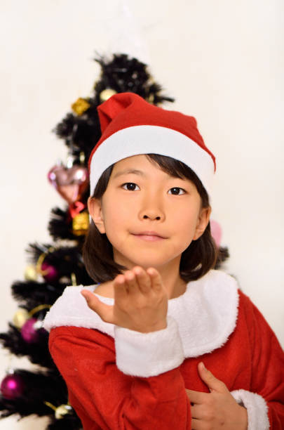 istock Girls enjoy Christmas party 889908362