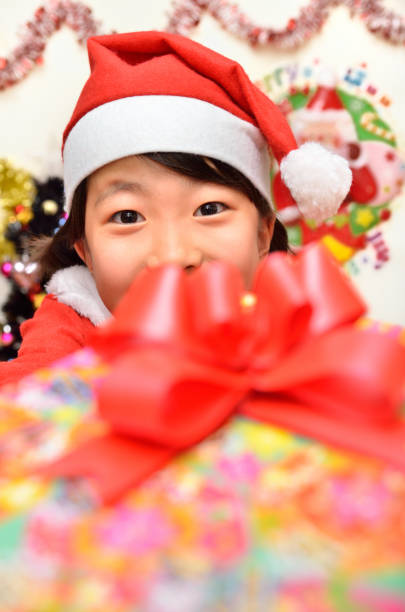 istock Girls enjoy Christmas party 889908552