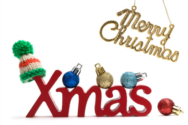 istock X-mas and merry christmas text, fur hat, ball on white background 889920180