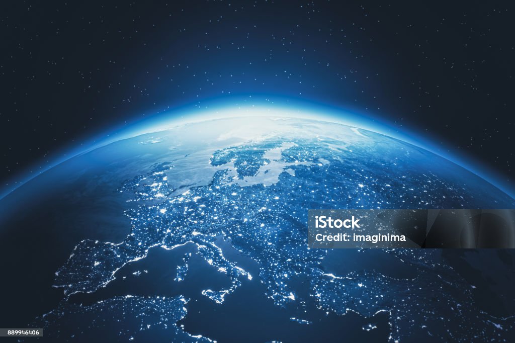 Cinematic Blue Earth View From Space At Night To Europe Earth with city lights view from space at night. Globe - Navigational Equipment Stock Photo