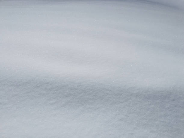 istock Fresh fluffy powdery snow with blinking crystal sparkles during cold winter, Austria, Europe 889949098