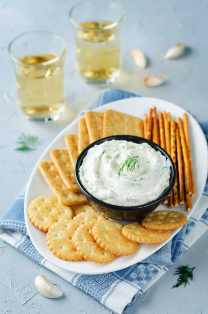 istock Feta cream cheese dill garlic dip with crackers 889963288