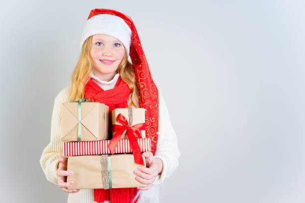 istock Girl wearing christmas cap 889968238