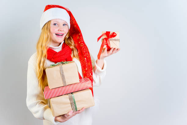 istock Girl wearing christmas cap 889968326