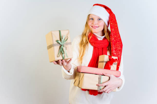 istock Girl wearing christmas cap 889968374