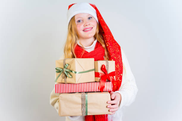 istock Girl wearing christmas cap 889968416