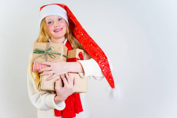 istock Girl wearing christmas cap 889968518
