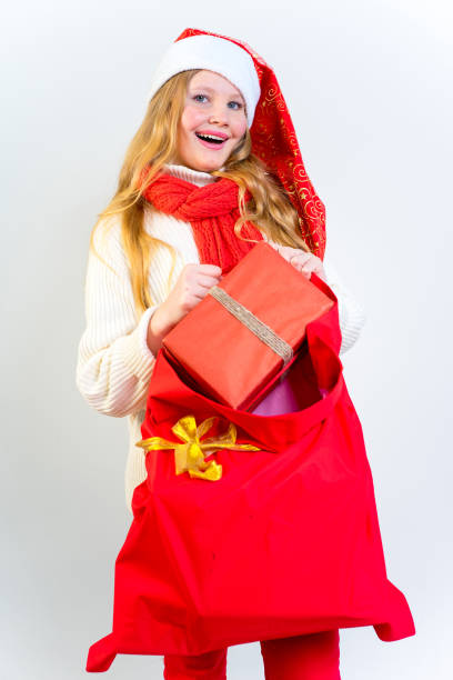 istock Girl wearing christmas cap 889971128
