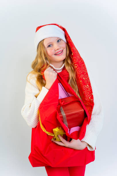 istock Girl wearing christmas cap 889971206