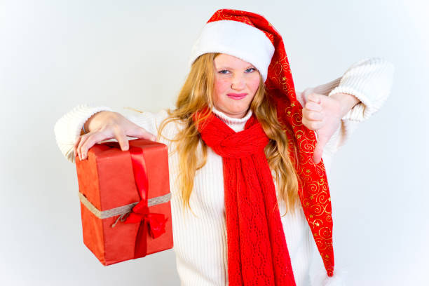 istock Girl wearing christmas cap 889971614