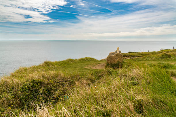 Stone bench at the South West Coast Path near Winspit Quarry, Worth Matravers, Jurassic Coast, Dorset, UK