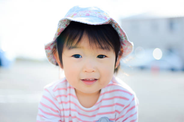 istock japanese cute children playing outdoor 889976032
