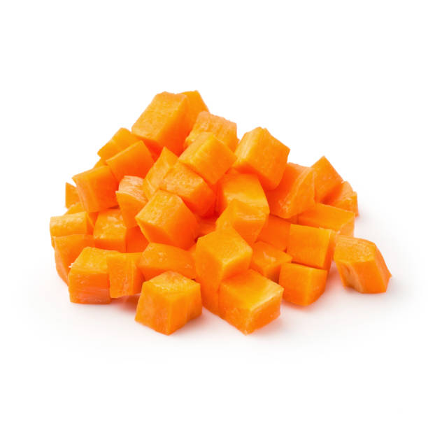 istock Chopped carrot slices isolated on a white background 889981602
