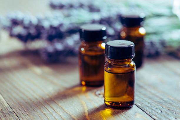 istock Aromatherapy tools, bottles with oil and lavender flowers 889984086
