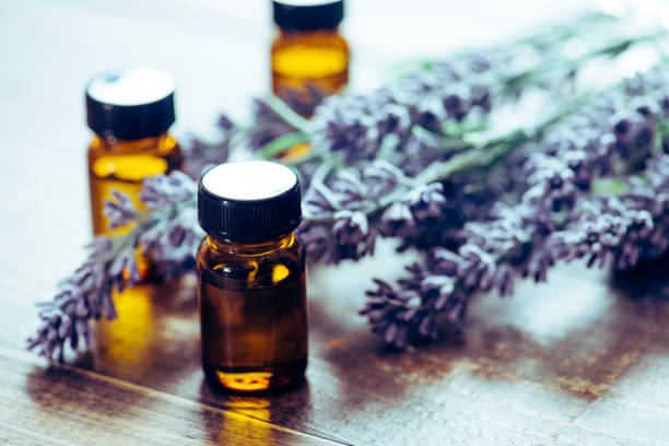 istock Aromatherapy tools, bottles with oil and lavender flowers 889991756