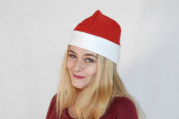 istock Christmas Santa Woman 889994300