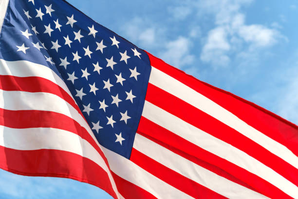 istock Waving star and stripes American flag 890001070
