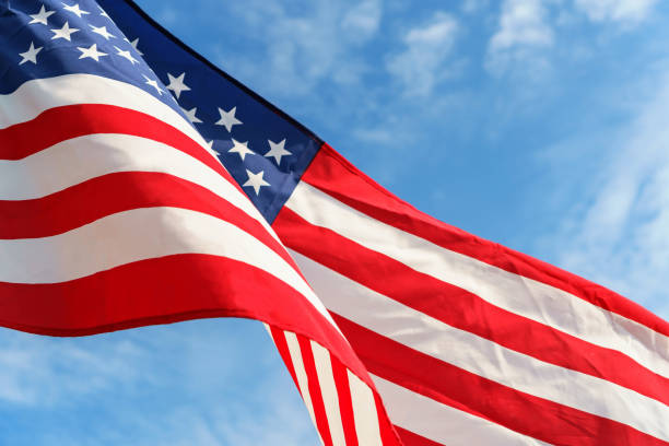 istock Waving star and stripes American flag 890001082