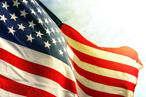 istock Waving star and stripes American flag 890001102