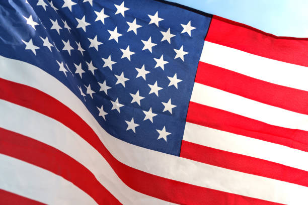 istock Waving star and stripes American flag 890001130
