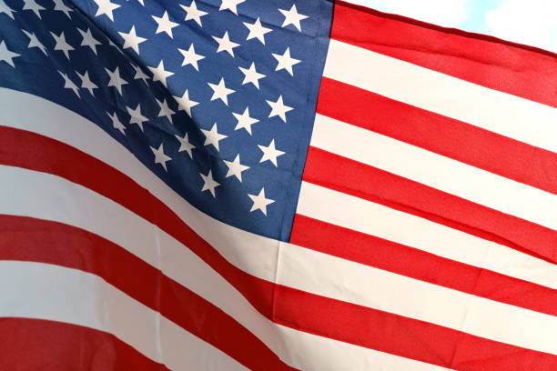 istock Waving star and stripes American flag 890001224