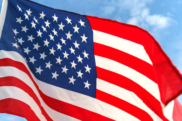 istock Waving star and stripes American flag 890001228