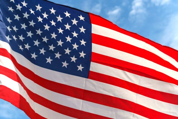 istock Waving star and stripes American flag 890001338