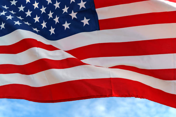 istock Waving star and stripes American flag 890001342