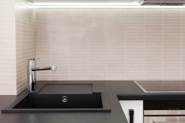 istock New modern kitchen with built in oven and chrome water tap 890004252