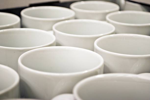 istock cups on the white shelves in the store 890004346