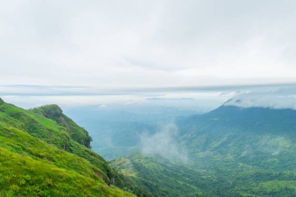 istock green mountain landscape have clouds and fog 890025464