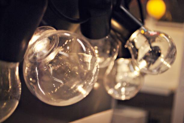 istock shining electrical lamps in a row 890025492