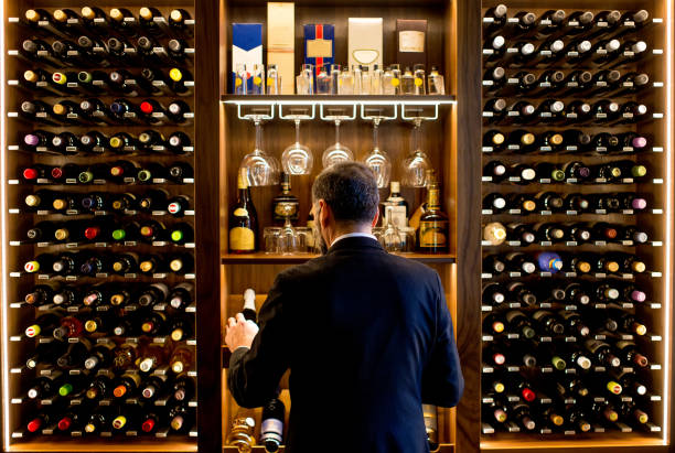 Man chooses a bottle of wine