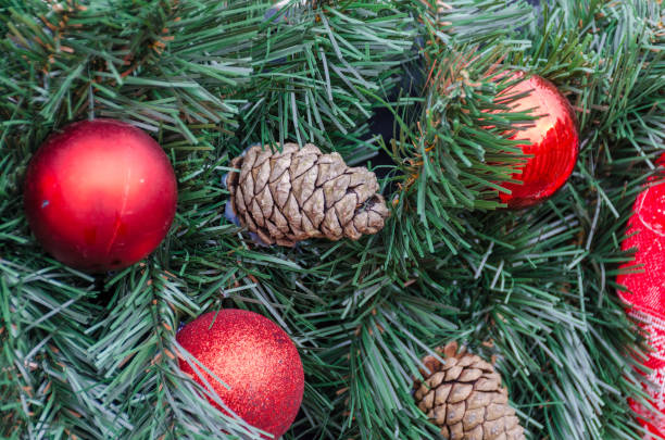 istock Christmas decoration baubles with branches of fir tree 890096614