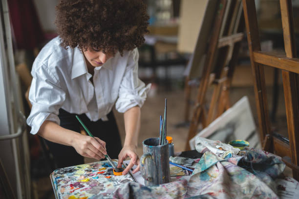 istock Young female artist 890109780